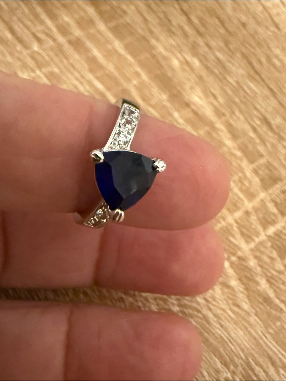 Elegant Blue Trillion-Cut Sapphire Ring with Pavé Accents